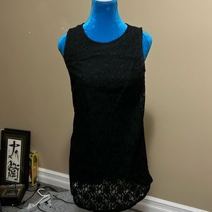 Size small Monteau black lace dress. Semi open back and sleeveless